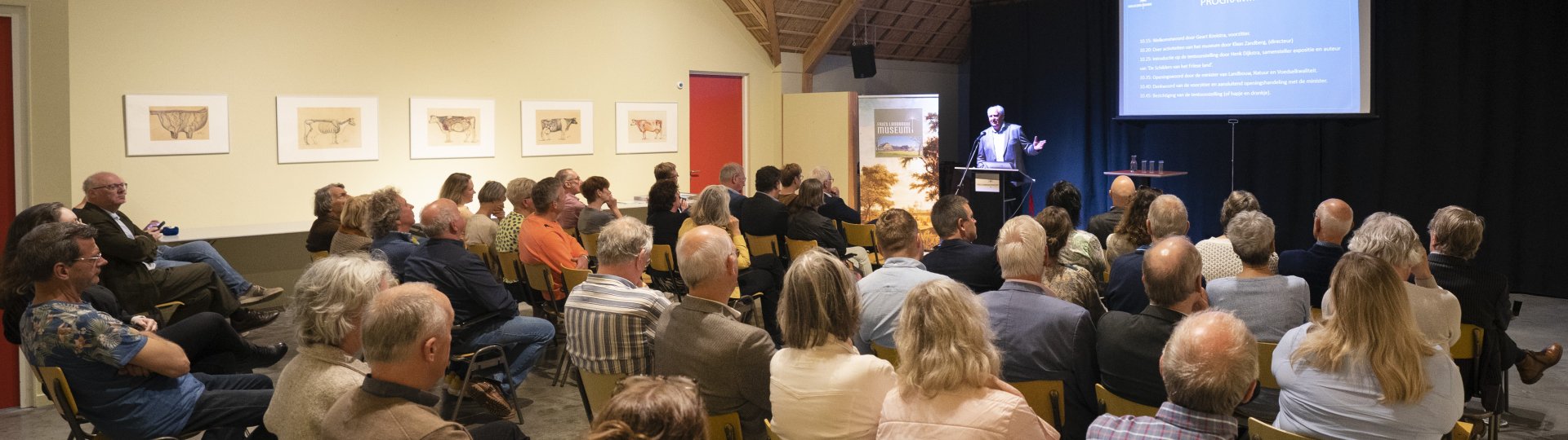 Volle zaal tijdens een lezing